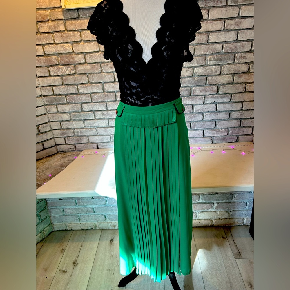 Green long skirt with front panel detailing.